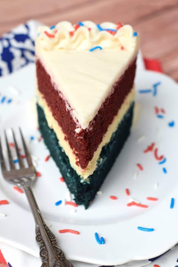 Red, White, and Blue Cheesecake Cake on a plate with a fork.