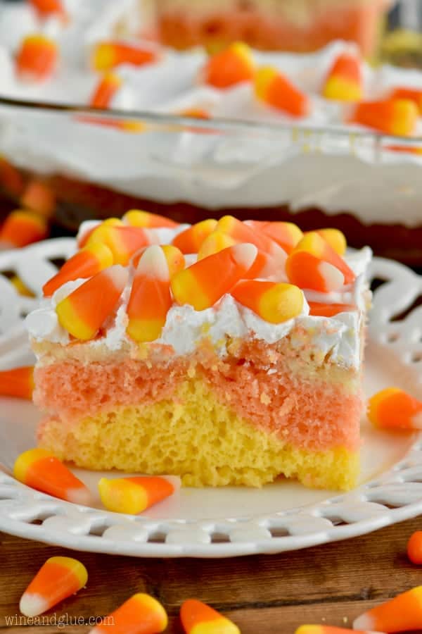 Candy Corn Poke Cake! Â The perfect Halloween dessert that is super easy to make but has a big wow factor!!