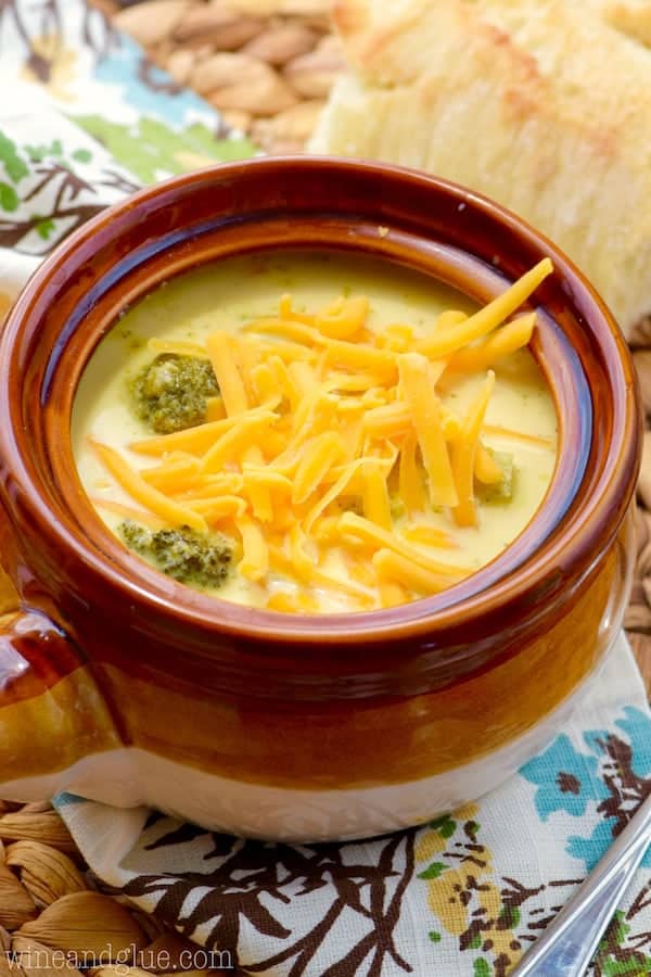 This Slow Cooker Broccoli Cheddar Soup is beyond simple, but so delicious! It definitely needs to be part of your dinner rotation!